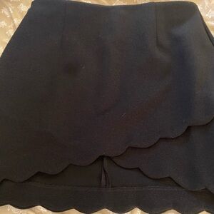 Black skirt w/ beautiful scallop design that layers in front.  Sz. 12.